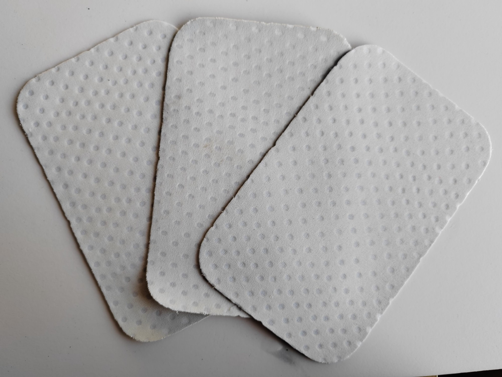 White Perforated Fabric